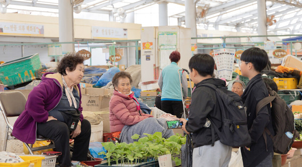 “전통시장 상인의 마음을 사진에 담아요”